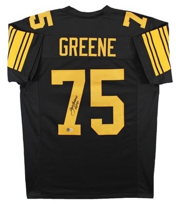 Joe Greene Signed Steelers Black Pro Style Jersey HOF 87 BAS Witnessed: Joe Greene Signed Steelers Black Pro Style Jersey HOF 87 BAS Witnessed This black pro style jersey features yellow numbers and has been personally signed by Joe Greene, including the inscription "HOF 