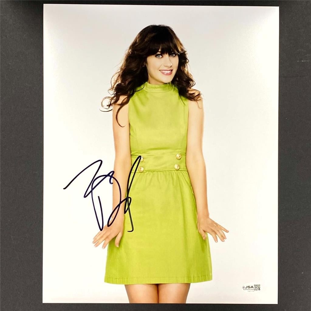 11x14 Photograph Autographed by Zooey Deschanel JSA Authenticated: 11x14 Photograph Autographed by Zooey Deschanel JSA Authenticated This original 11x14 photograph is signed by Zooey Deschanel and comes with James Spence (JSA) autograph authentication. The item is pr