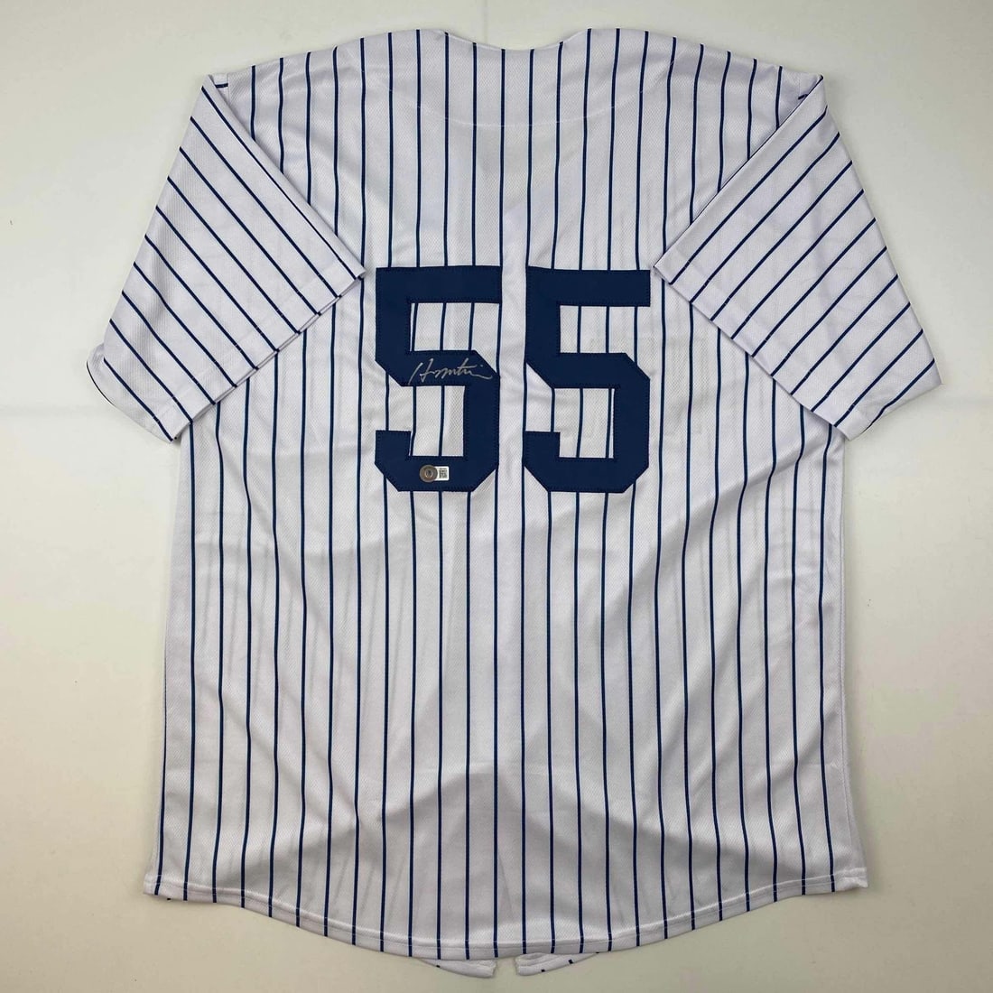 Autographed Hideki Matsui Yankees Pinstripe Jersey Beckett BAS COA: Autographed Hideki Matsui Yankees Pinstripe Jersey Beckett BAS COA This authentic autographed Hideki Matsui New York Pinstripe Jersey features the signature of the legendary MLB player, certified by B