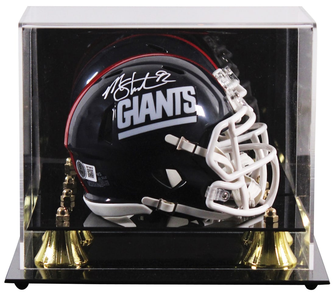 Michael Strahan Autographed 1981-99 Giants Mini Helmet with Beckett Authentication: Michael Strahan Autographed 1981-99 Giants Mini Helmet with Beckett Authentication This 1981-99 Throwback Speed Mini Helmet is personally signed by Michael Strahan of the New York Giants, showcasing h
