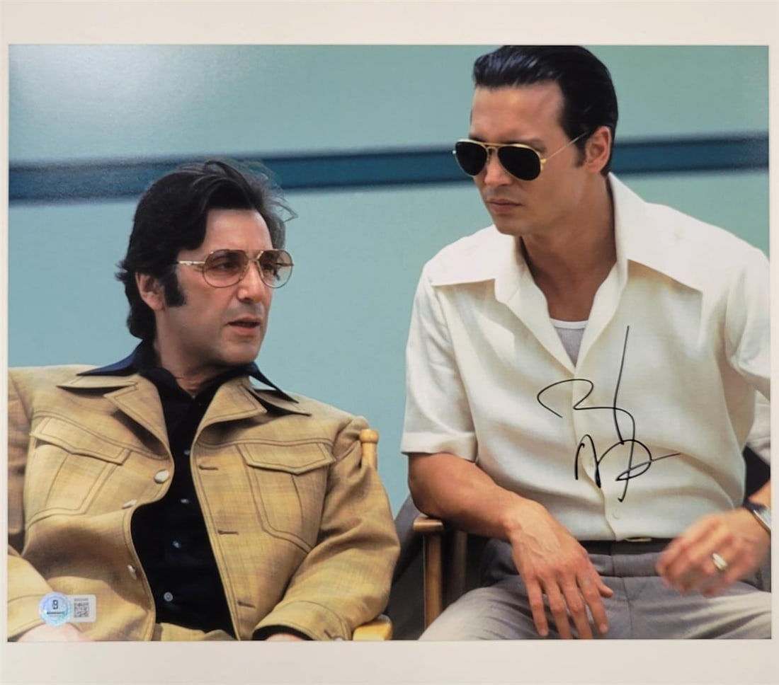 11x14 Donnie Brasco photo autographed by Johnny Depp Beckett authenticated: 11x14 Donnie Brasco photo autographed by Johnny Depp Beckett authenticated This original 11x14 photograph from the film Donnie Brasco is hand-signed by Johnny Depp. The autograph has been authenticate