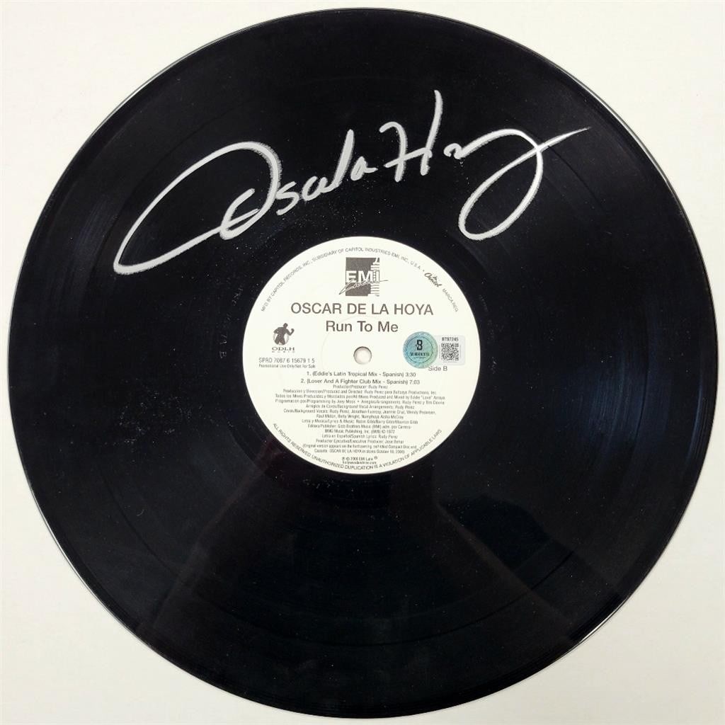 Oscar De La Hoya autographed Run to Me LP vinyl with Beckett authentication: Oscar De La Hoya autographed Run to Me LP vinyl with Beckett authentication This is an original Oscar De La Hoya signed 'Run to Me' vinyl record LP. The autograph has been authenticated by Beckett Aut