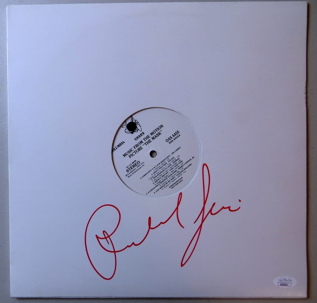 Richard Jeni JSA Authenticated Signed Record Album Cover and Vinyl: Richard Jeni JSA Authenticated Signed Record Album Cover and Vinyl This is an original record album sleeve for "The Mask" signed by Richard Jeni. Both the album cover and the record itself are autogra