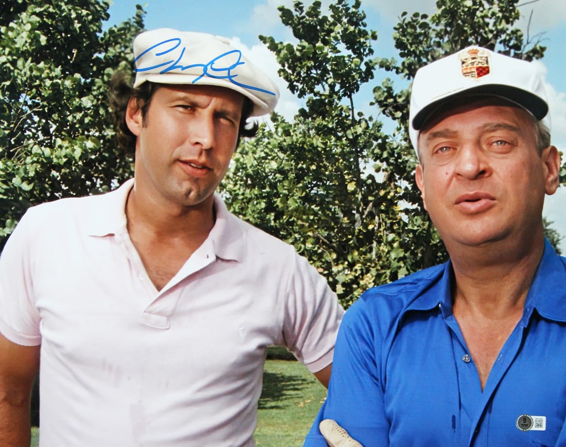 Chevy Chase Autographed 16x20 Caddyshack Photo BAS Witnessed: Chevy Chase Autographed 16x20 Caddyshack Photo BAS Witnessed This stunning 16x20 photograph features Chevy Chase, personally signed in bold ink. As an iconic piece from the classic film 'Caddyshack,' 