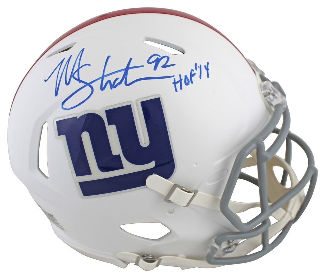 Michael Strahan Signed Riddell Full Size Giants Flat White Speed Helmet Beckett COA: Michael Strahan Signed Riddell Full Size Giants Flat White Speed Helmet Beckett COA This flat white Riddell authentic full size Speed Proline helmet features the signature of Michael Strahan, inscribe