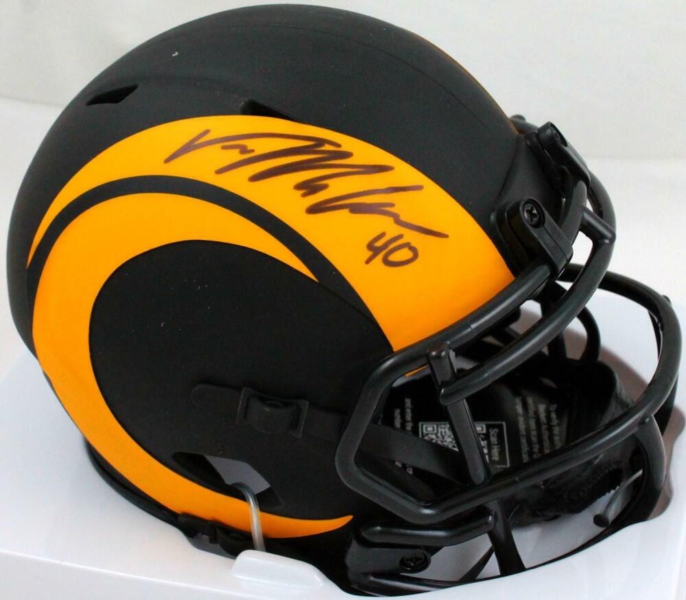 Von Miller Signed Los Angeles Rams Mini Helmet Beckett Authenticated: Von Miller Signed Los Angeles Rams Mini Helmet Beckett Authenticated This is an original mini helmet representing the Los Angeles Rams, autographed by star player Von Miller. The helmet features a str