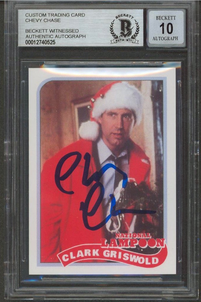 Chevy Chase Signed National Lampoon Trading Card Gem Mint 10 BAS Slabbed: Chevy Chase Signed National Lampoon Trading Card Gem Mint 10 BAS Slabbed This is a signed trading card featuring Chevy Chase, graded Gem Mint 10 by Beckett Authentication Services. The card is a part 