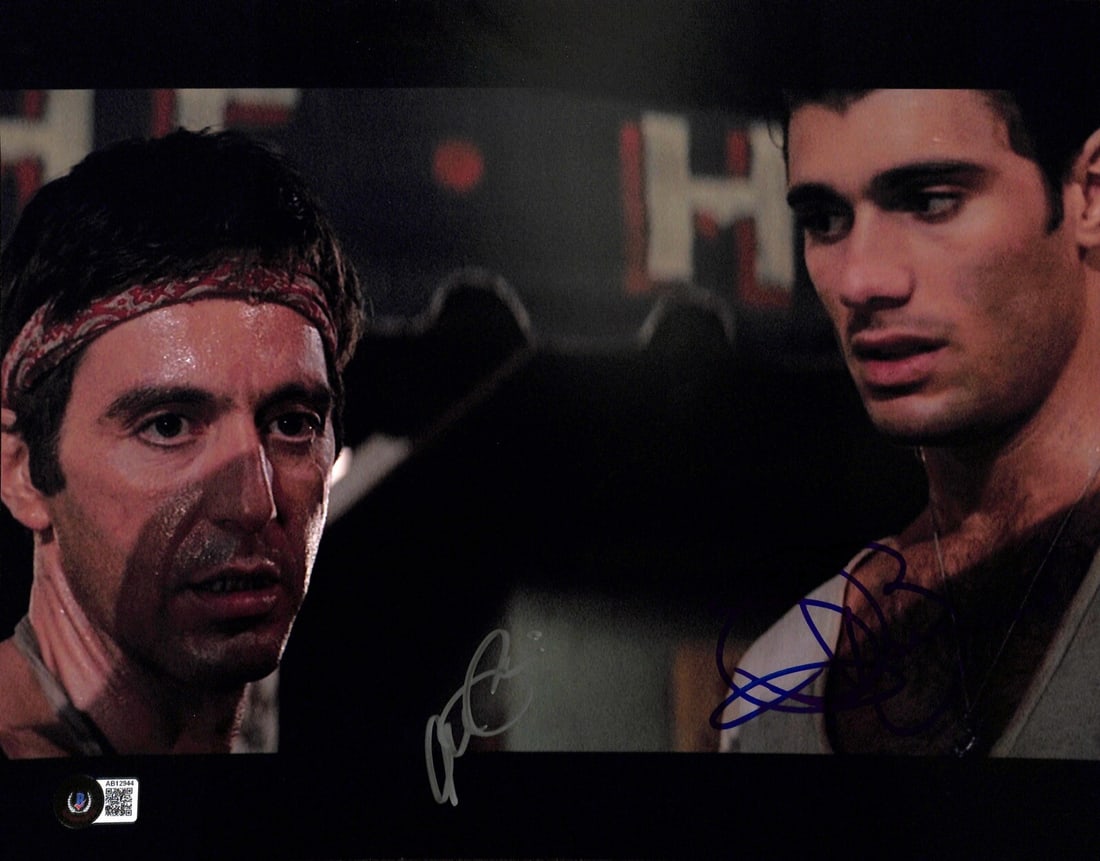 Al Pacino Steven Bauer Scarface Signed 11x14 Photo with Beckett LOA: Al Pacino Steven Bauer Scarface Signed 11x14 Photo with Beckett LOA This remarkable 11x14 color photograph features the iconic actors Al Pacino and Steven Bauer, both of whom have signed the image in 