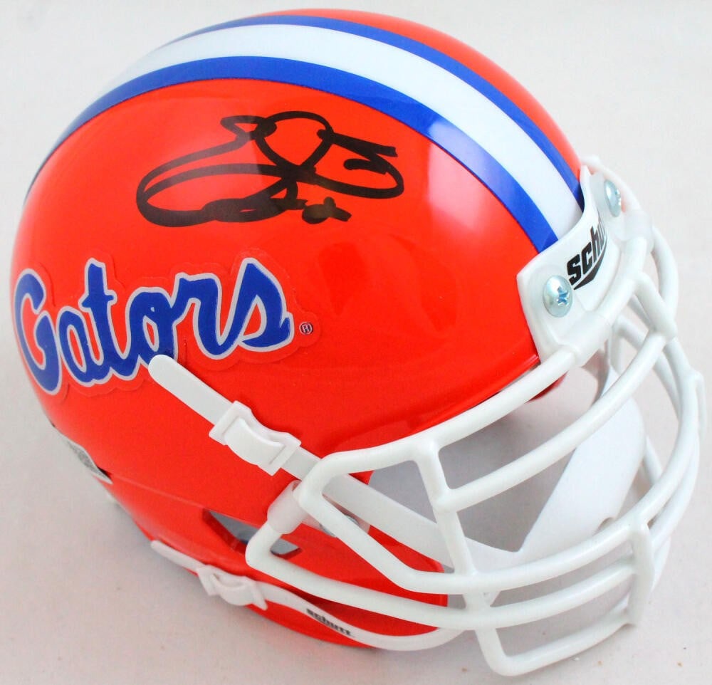 Emmitt Smith Signed Florida Gators Mini Helmet with Beckett Authentication: Emmitt Smith Signed Florida Gators Mini Helmet with Beckett Authentication This original mini helmet is a collectible item featuring the iconic signature of Emmitt Smith, one of football's greatest pl