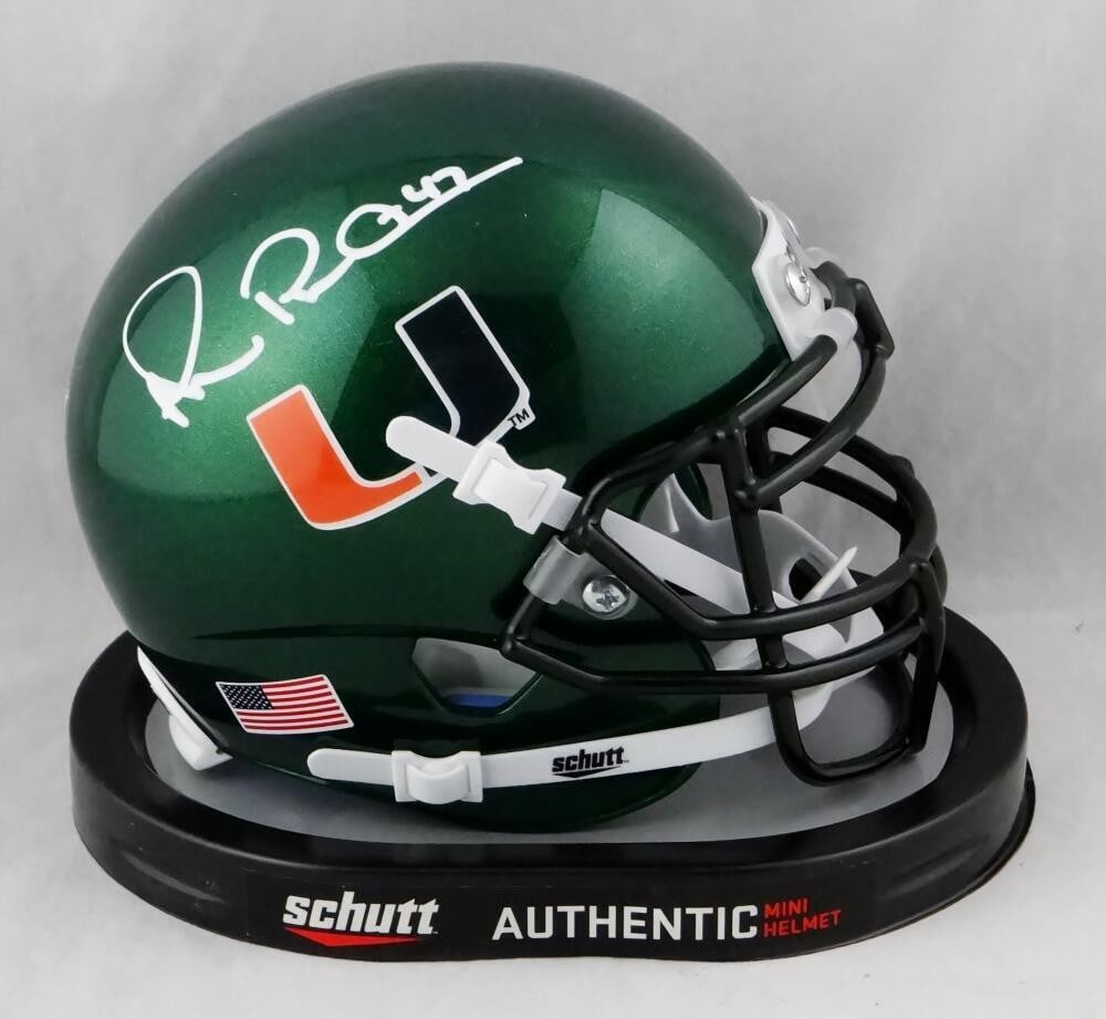 Miami Hurricanes Schutt Mini Helmet Signed by Michael Irvin JSA Authenticated: Miami Hurricanes Schutt Mini Helmet Signed by Michael Irvin JSA Authenticated This is a pre-owned Miami Hurricanes green Schutt mini helmet, autographed by Michael Irvin. The signature has been authen