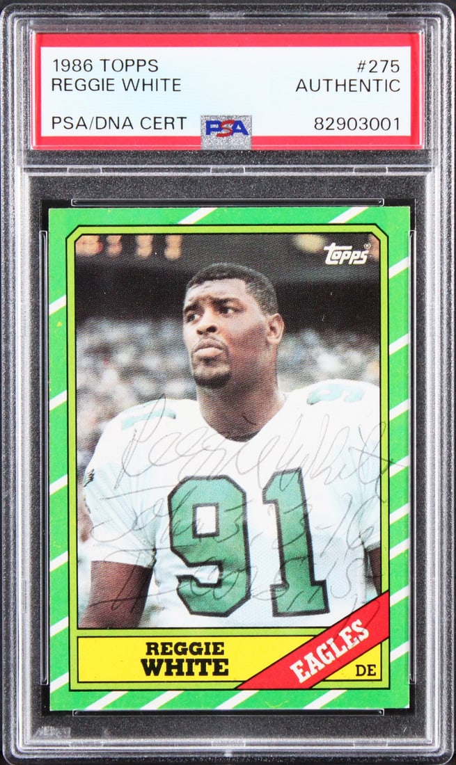 Reggie White 1986 Topps Card Signed With Inscription PSA DNA Authenticated Slab: Reggie White 1986 Topps Card Signed With Inscription PSA DNA Authenticated Slab This is an original 1986 Topps #275 football card personally signed by Reggie White of the Philadelphia Eagles. The card