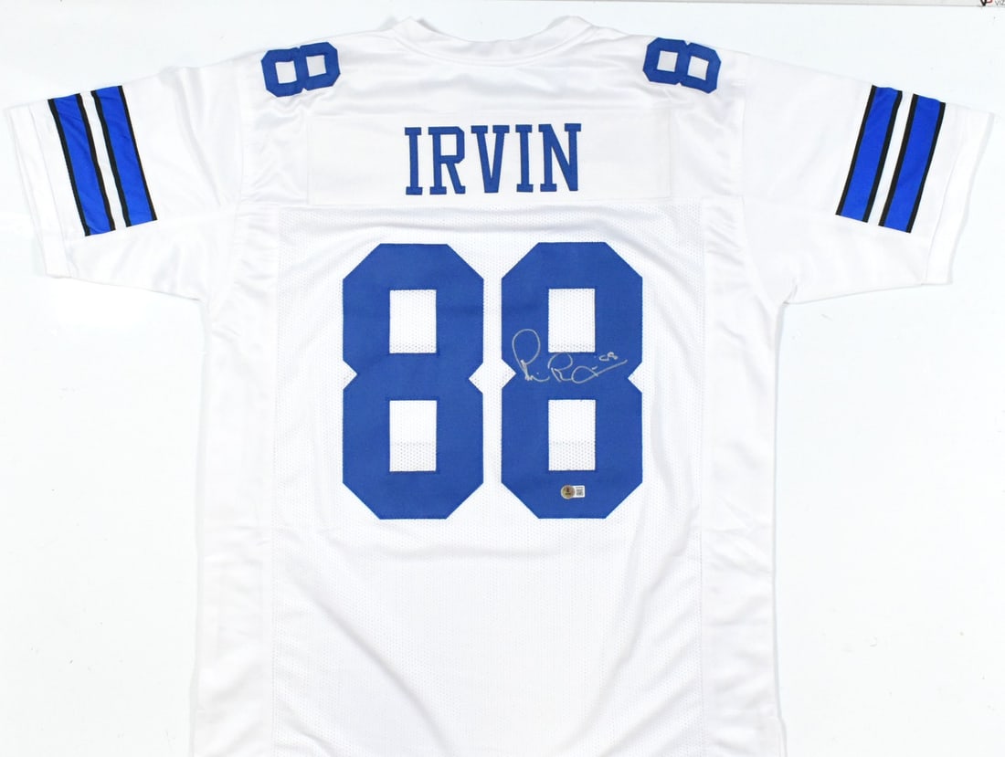 Dallas Cowboys Michael Irvin Signed White Jersey Beckett Authenticated: Dallas Cowboys Michael Irvin Signed White Jersey Beckett Authenticated This white Pro Style football jersey is autographed by Michael Irvin and comes with Beckett authentication, including a Beckett W