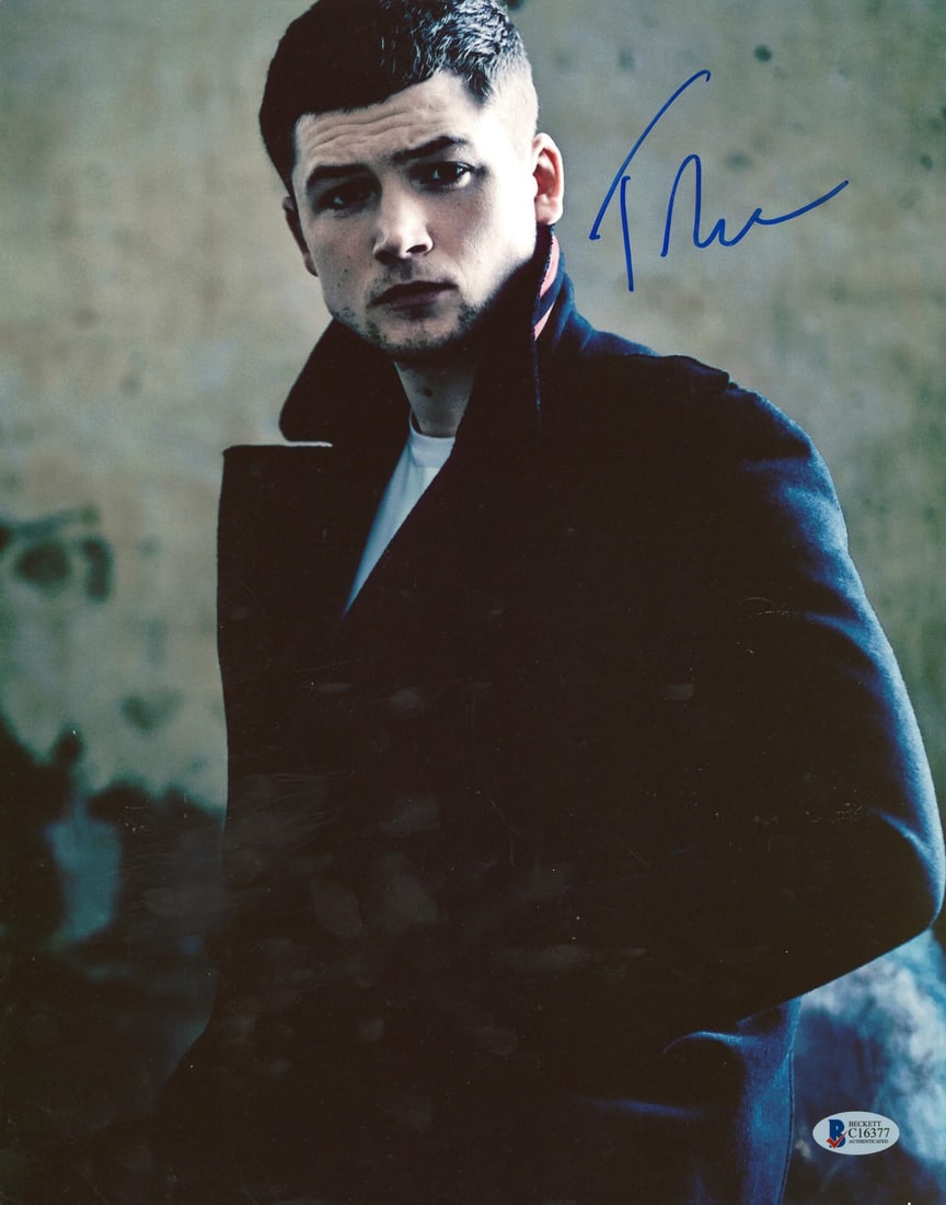 Beckett authenticated Taron Egerton signed Kingsman photo 11x14: Beckett authenticated Taron Egerton signed Kingsman photo 11x14 This is an original 11x14 photograph personally signed by Taron Egerton from "Kingsman: The Secret Service." The autograph is authentica