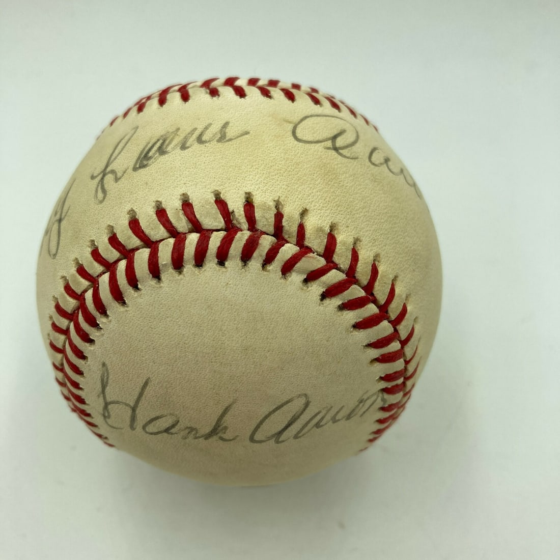 Hank Aaron Full Name Signed Baseball JSA COA Rare Authentic: Hank Aaron Full Name Signed Baseball JSA COA Rare Authentic This is a rare Hank Aaron autographed baseball, featuring his full name, "Henry Louis Aaron," signed across the sweet spot, with an addition