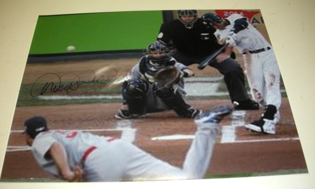 Signed 11x14 Photo Derek Jeter With COA New York Yankees Hall Of Fame: Signed 11x14 Photo Derek Jeter With COA New York Yankees Hall Of Fame This is an original 11x14 photo signed by Derek Jeter, featuring his time with the New York Yankees and the Tampa Bay Rays. The it