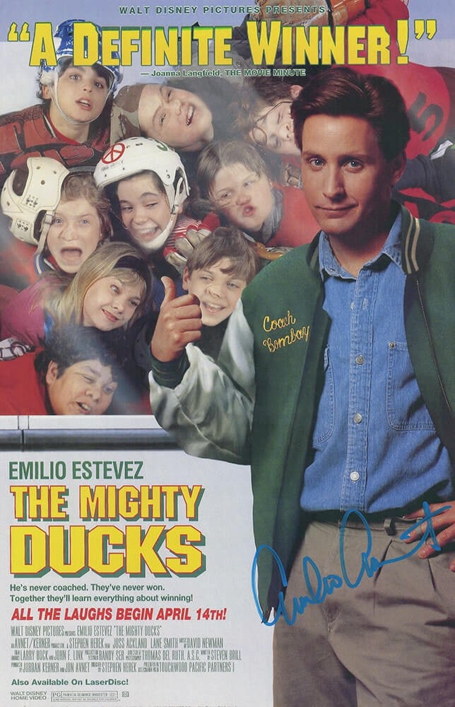 Emilio Estevez Signed Mighty Ducks 11x17 Poster with COA: Emilio Estevez Signed Mighty Ducks 11x17 Poster with COA This original 11x17 movie poster of The Mighty Ducks is signed by Emilio Estevez in striking blue paint. The poster is pre-owned and features a