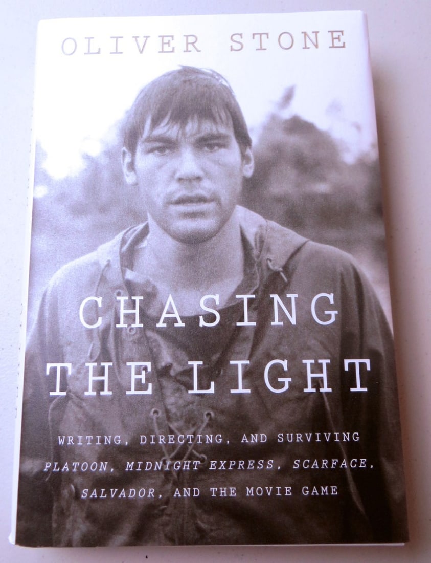 Chasing the Light Hardcover Signed by Oliver Stone with JSA Authentication: Chasing the Light Hardcover Signed by Oliver Stone with JSA Authentication This is a hardcover copy of the book "Chasing the Light" signed by Oliver Stone. The autograph has been authenticated by Jame