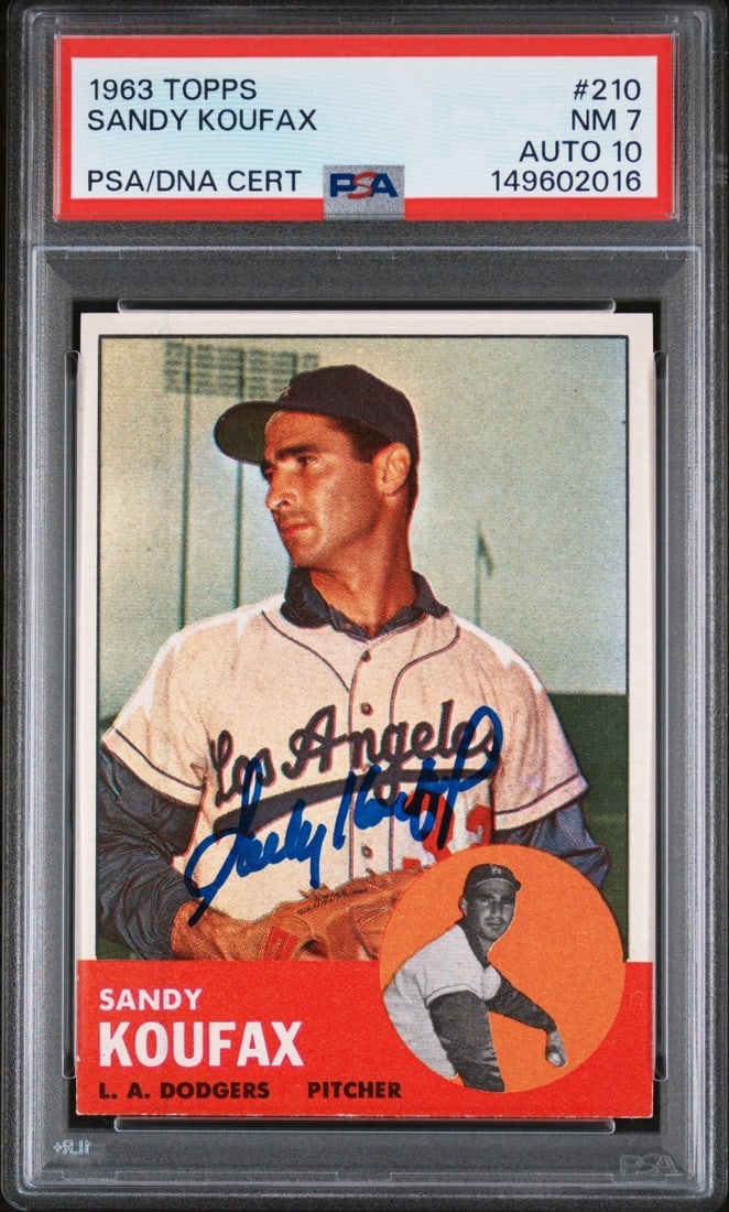 1963 Topps Sandy Koufax Signed Baseball Card PSA 7 With Auto Grade 10: 1963 Topps Sandy Koufax Signed Baseball Card PSA 7 With Auto Grade 10 This 1963 Topps Sandy Koufax baseball card, card number 210, features an authentic hand signature by Sandy Koufax. Professionally 