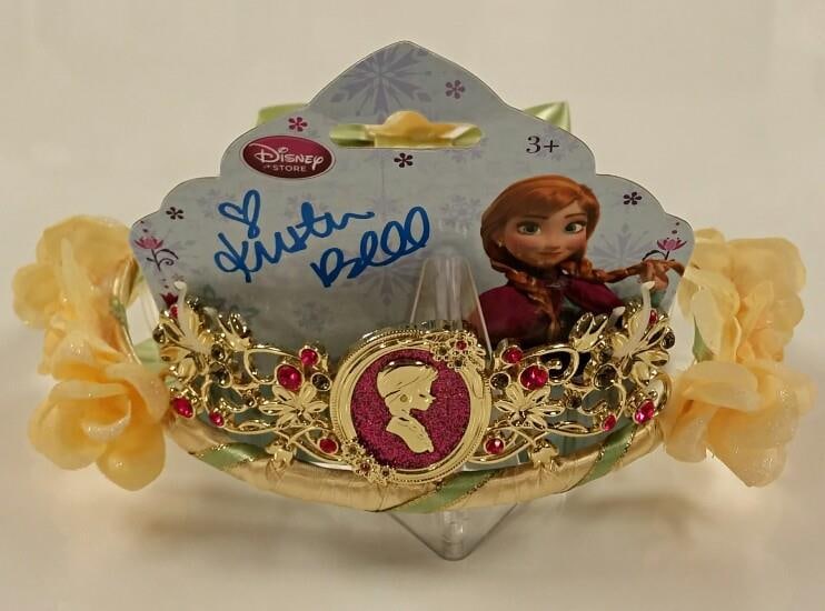 Frozen Anna Coronation Tiara Signed by Kristen Bell PSA/DNA Authenticated: Frozen Anna Coronation Tiara Signed by Kristen Bell PSA/DNA Authenticated This original Disney Frozen Anna Coronation Flower Crown has been hand-signed by Kristen Bell. The autograph is authenticated 
