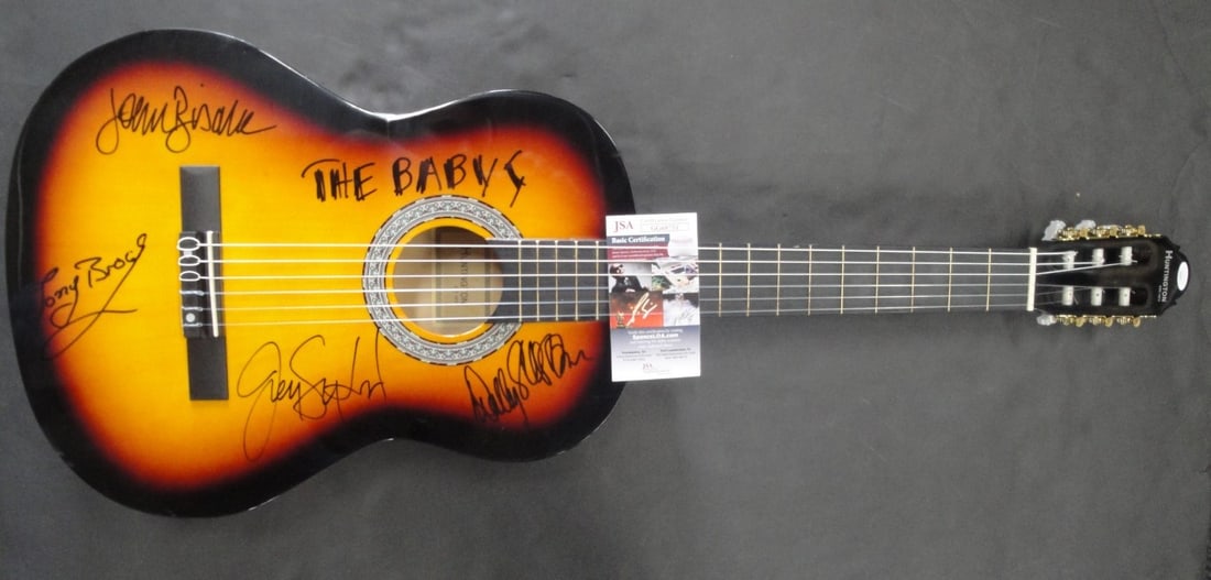 The Babys Signed Guitar with JSA Authentication by Wally Stocker Tony Brock: The Babys Signed Guitar with JSA Authentication by Wally Stocker Tony Brock This is an authentic autographed guitar featuring signatures from Wally Stocker, Tony Brock, John Bisaha, and Joey Sykes. Th