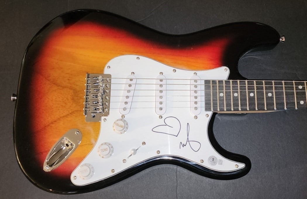 Moby Signed Electric Guitar with JSA Authentication: Moby Signed Electric Guitar with JSA Authentication This is a pre-owned electric guitar signed by Moby, a renowned musician known for his unique contributions to the music industry. The signature has 