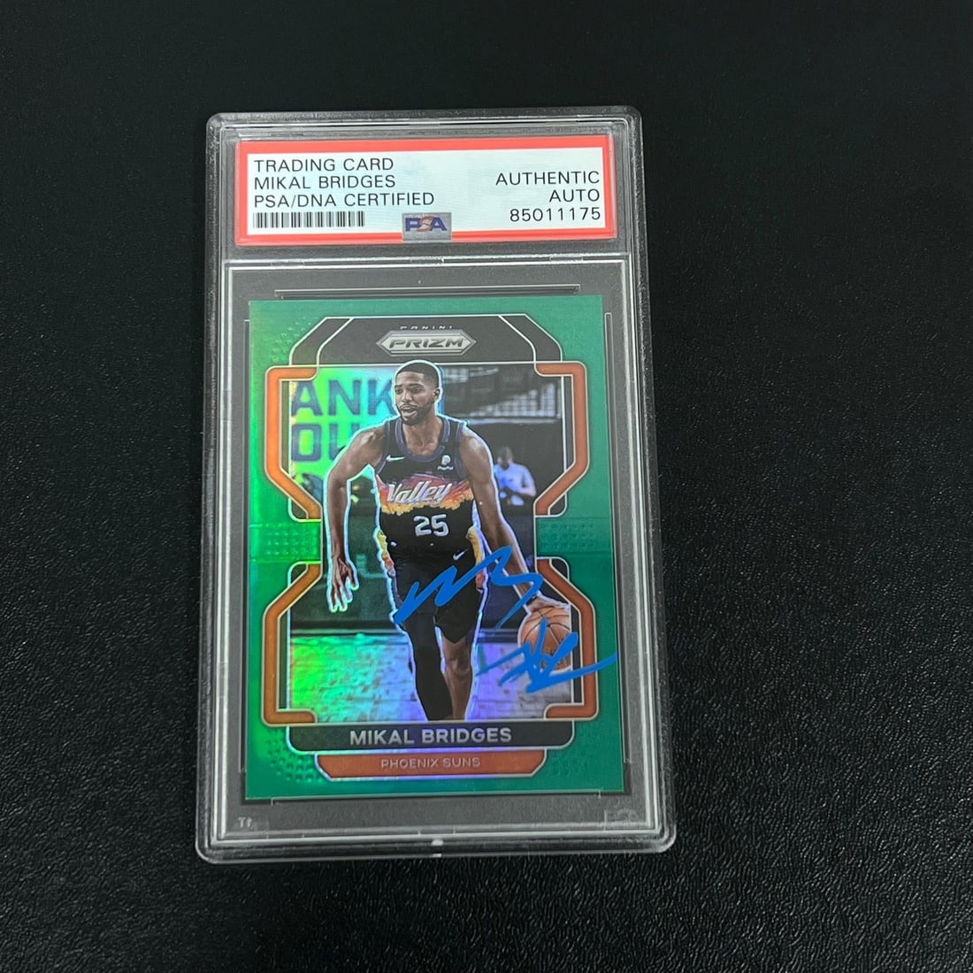 2021-22 Panini Prizm Mikal Bridges Signed Card PSA/DNA Slabbed Suns: 2021-22 Panini Prizm Mikal Bridges Signed Card PSA/DNA Slabbed Suns This is a 2021-22 Panini Prizm #27 trading card, featuring the signature of Mikal Bridges, who is known for his time with the Phoeni