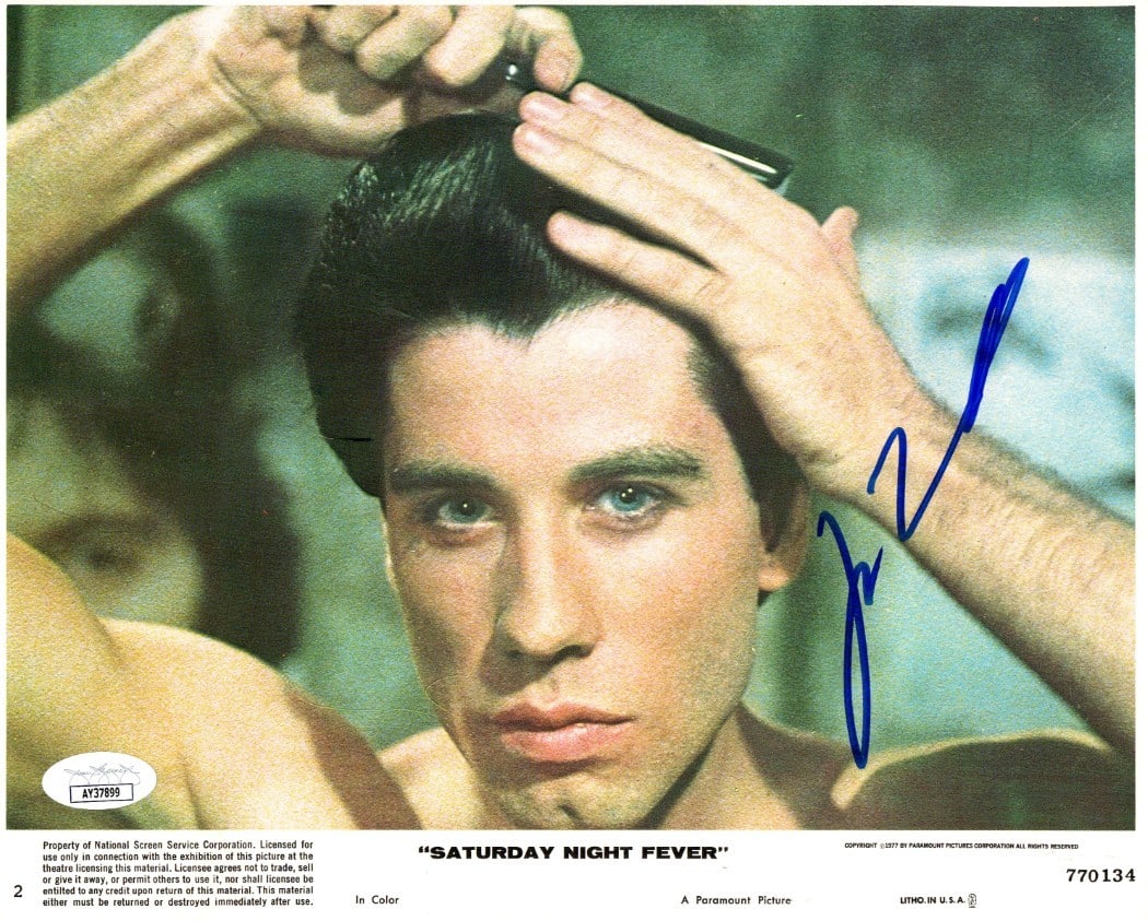 8x10 Photograph Signed by John Travolta Saturday Night Fever JSA Authenticated: 8x10 Photograph Signed by John Travolta Saturday Night Fever JSA Authenticated This is an original 8x10 photograph autographed by John Travolta, featuring a scene from Saturday Night Fever. The signat