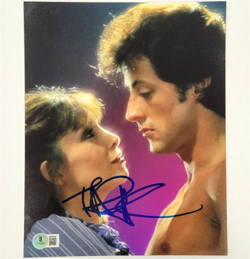 Beckett BAS signed 8x10 Rocky photo by Talia Shire Adrian Balboa: Beckett BAS signed 8x10 Rocky photo by Talia Shire Adrian Balboa This is an original 8x10 photograph signed by Talia Shire, who portrayed Adrian Balboa in the movie Rocky. The autograph is authenticat