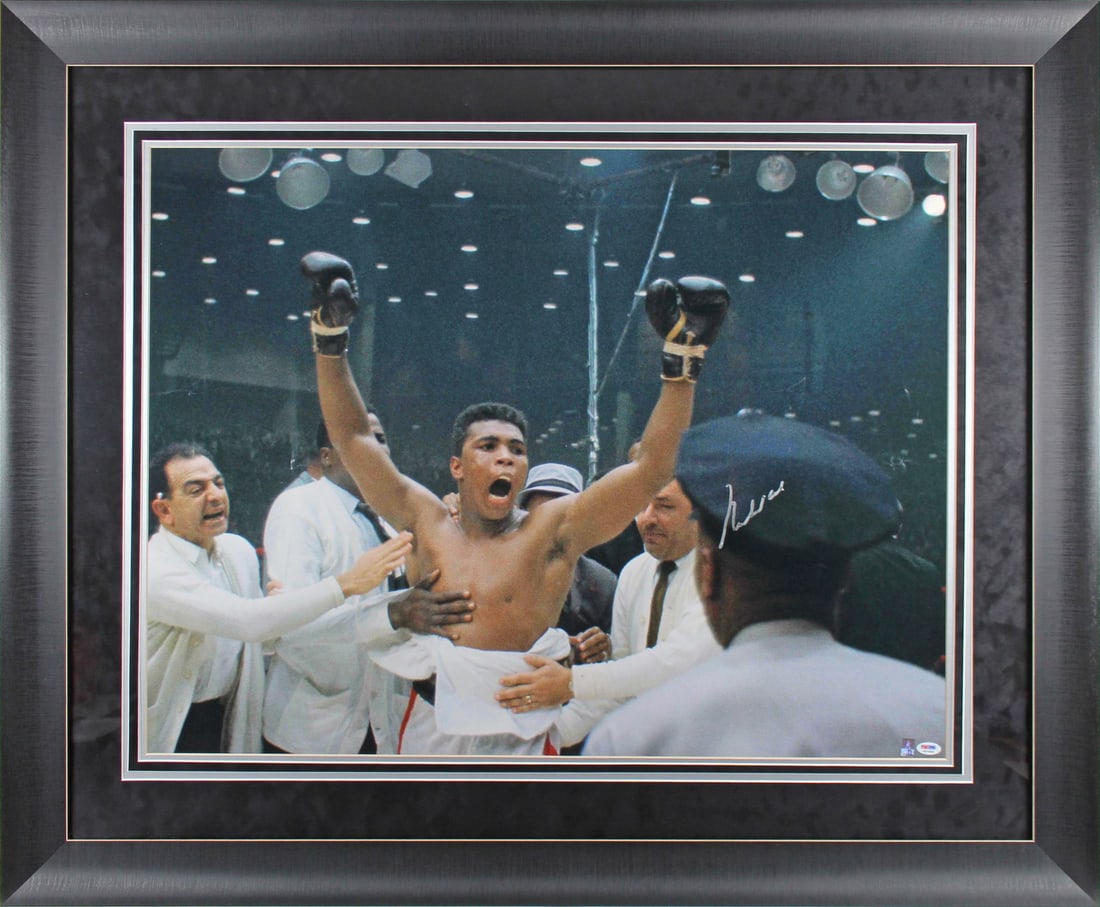 Muhammad Ali Signed Framed 26x34 Photo Gem Mint 10 PSA/DNA Certified: Muhammad Ali Signed Framed 26x34 Photo Gem Mint 10 PSA/DNA Certified Capture a piece of boxing history with this authentic signed framed photo of the legendary Muhammad Ali. This striking 26x34 photo 
