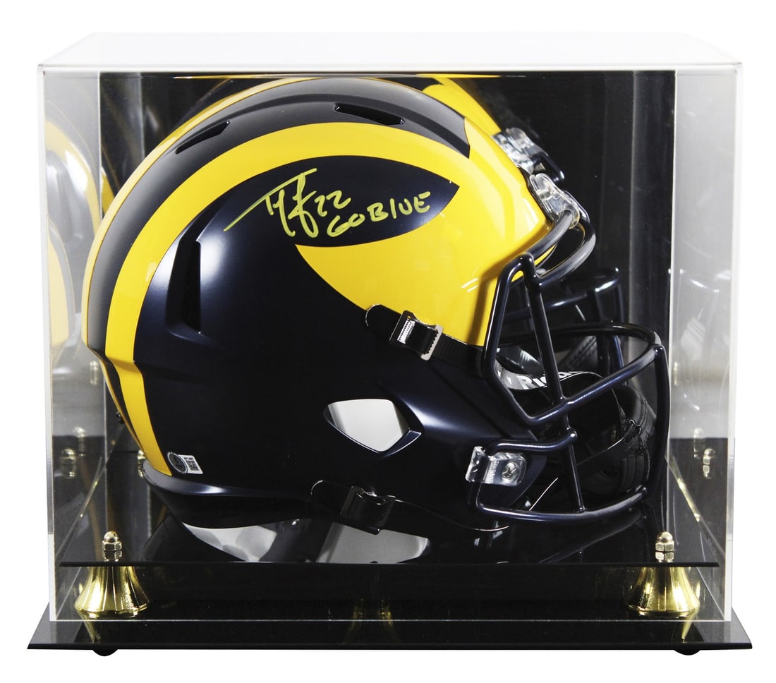 Ty Law Signed Michigan Wolverines Helmet with Go Blue Inscription BAS Authenticated: Ty Law Signed Michigan Wolverines Helmet with Go Blue Inscription BAS Authenticated This full-size Riddell Speed Replica Helmet is a must-have collectible for any Michigan Wolverines fan. Personally s