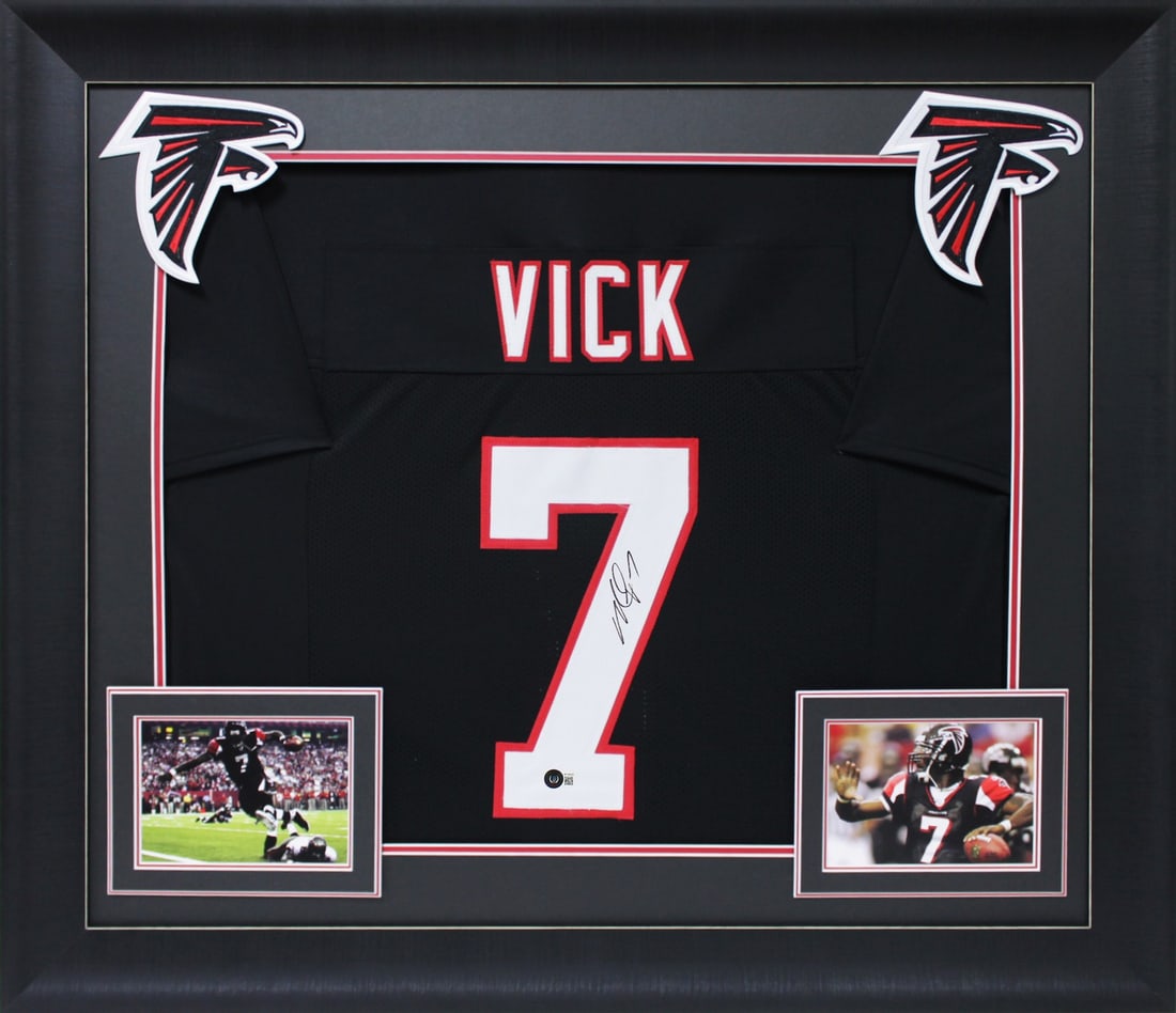 Michael Vick Signed Black Pro Style Framed Jersey BAS Witnessed Atlanta Falcons: Michael Vick Signed Black Pro Style Framed Jersey BAS Witnessed Atlanta Falcons This authentic black pro style framed jersey has been personally signed by Michael Vick, former quarterback of the Atlan