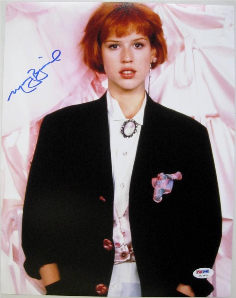 Molly Ringwald Signed 11x14 Sixteen Candles Photo PSA/DNA Authenticated: Molly Ringwald Signed 11x14 Sixteen Candles Photo PSA/DNA Authenticated This stunning 11x14 photograph from the classic film "Sixteen Candles" is autographed by the talented actress Molly Ringwald. Th