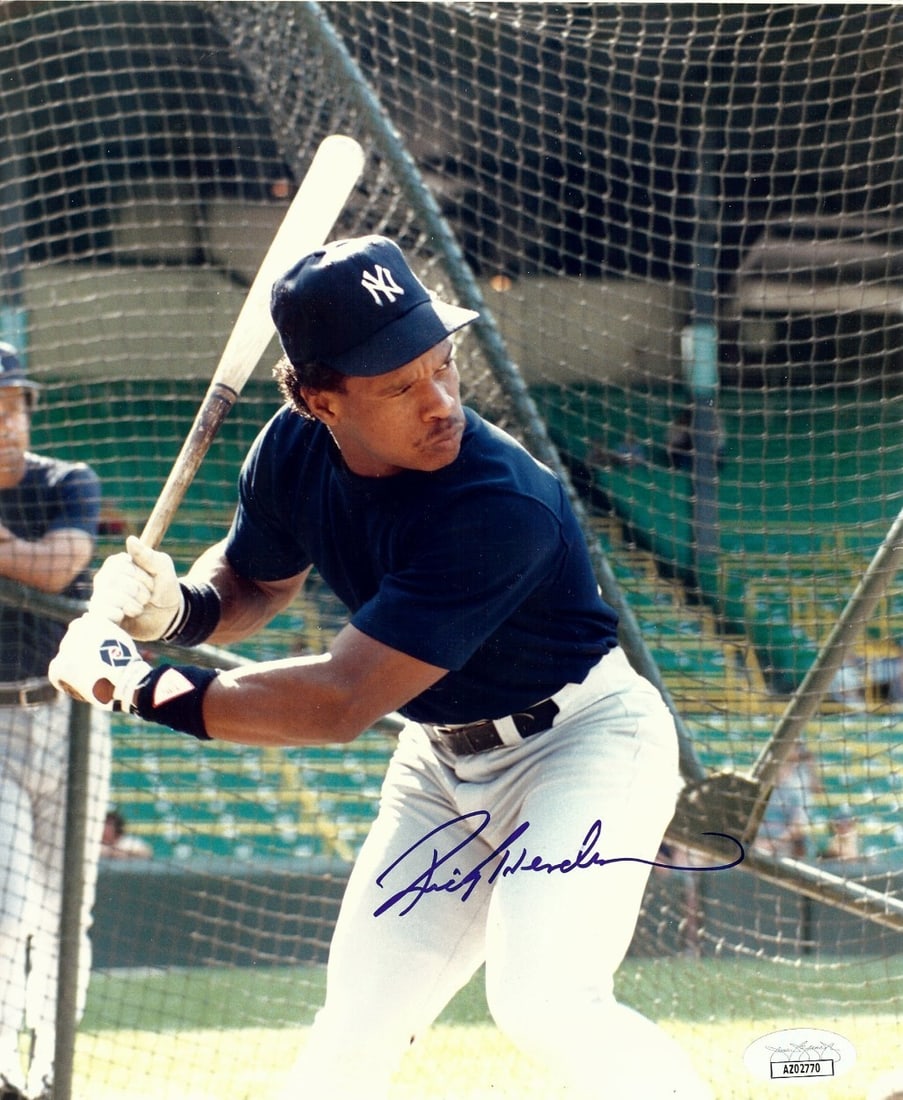 Rickey Henderson Signed 8X10 Yankees Photo JSA Authenticated: Rickey Henderson Signed 8X10 Yankees Photo JSA Authenticated This is an authentic 8x10 photo of Rickey Henderson, the legendary New York Yankees player, showcasing him in a batting cage. The photo has