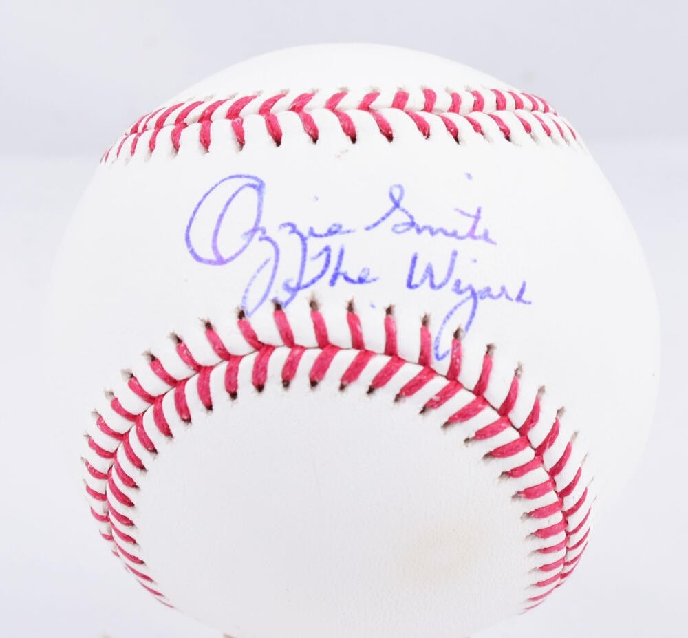 Ozzie Smith Signed OML Baseball Fanatics Authentic St. Louis Cardinals: Ozzie Smith Signed OML Baseball Fanatics Authentic St. Louis Cardinals This is an original OML baseball autographed by the legendary Ozzie Smith, famously known as 'The Wizard.' The baseball features 