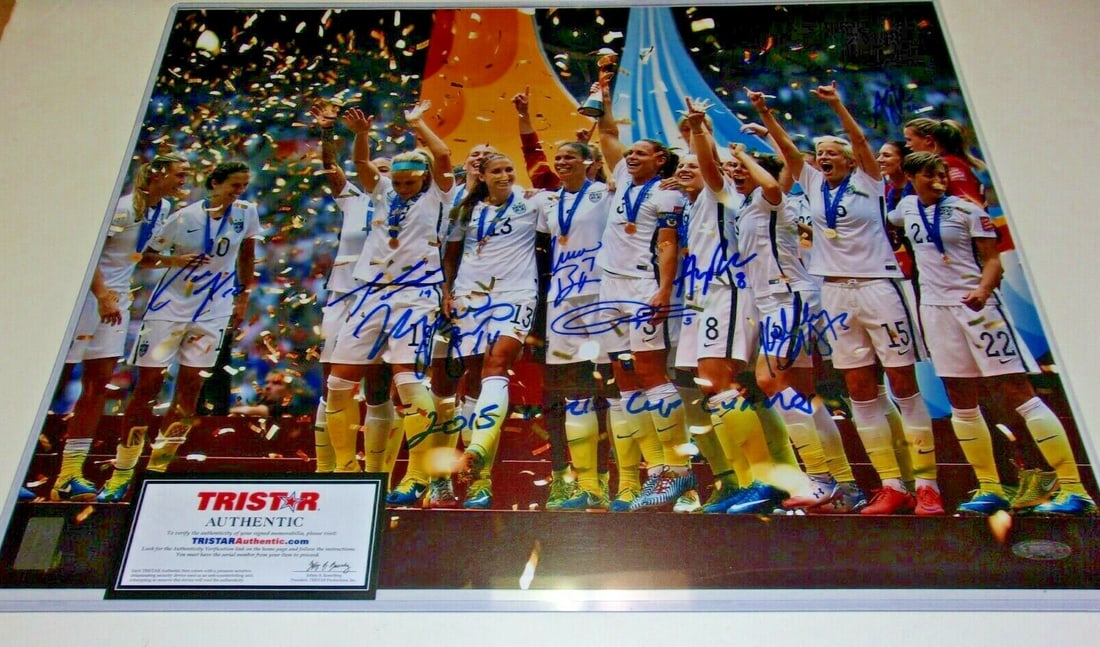 Team USA 2015 World Cup Champions 16x20 Photo Signed by Nine With TRISTAR COA: Team USA 2015 World Cup Champions 16x20 Photo Signed by Nine With TRISTAR COA This 16x20 photo celebrates Team USA's victory as the 2015 Women's World Cup champions. The photograph features the signat
