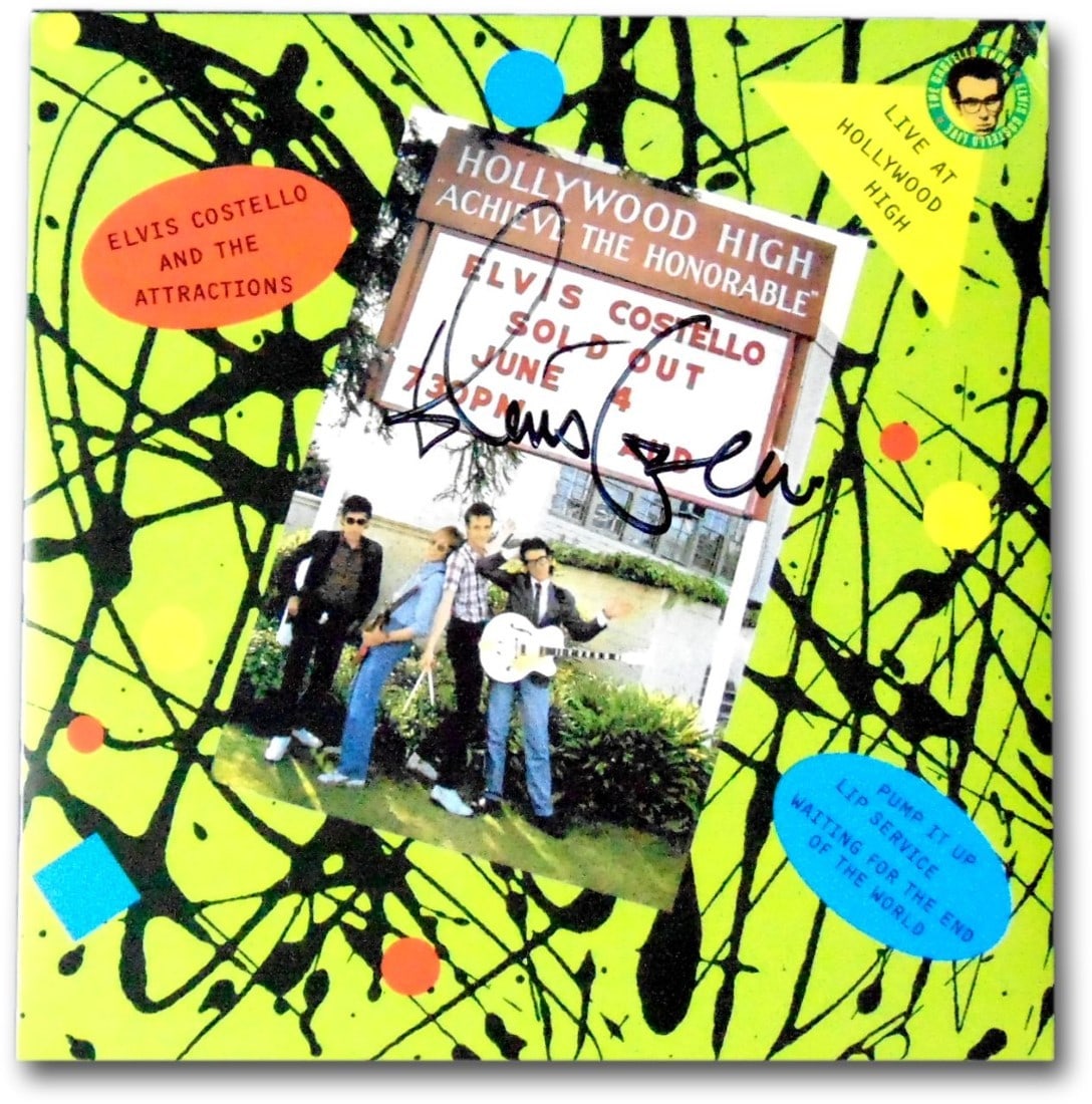 Elvis Costello Autographed 45 Record Sleeve Live Hollywood High JSA: Elvis Costello Autographed 45 Record Sleeve Live Hollywood High JSA Celebrate the music of Elvis Costello with this autographed 45 record sleeve from the iconic performance at Hollywood High. This ori