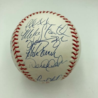 Official 1998 Yankees Team Autographed World Series Baseball With JSA COA: Official 1998 Yankees Team Autographed World Series Baseball With JSA COA This is an official 1998 World Series baseball signed in blue ink by twenty members of the 1998 World Champion New York