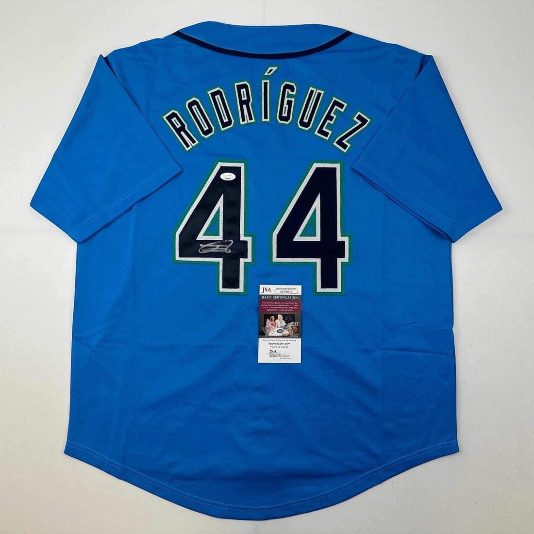 Julio Rodriguez Autographed Light Blue Mariners Jersey JSA COA: Julio Rodriguez Autographed Light Blue Mariners Jersey JSA COA Celebrate your passion for baseball with this autographed Julio Rodriguez Seattle Light Blue Baseball Jersey. Featuring a bold design, th