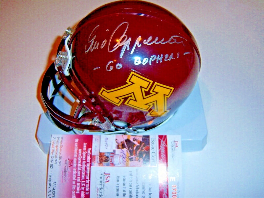 Signed Gino Cappelletti Minnesota Gophers Riddell Mini Helmet with JSA COA: Signed Gino Cappelletti Minnesota Gophers Riddell Mini Helmet with JSA COA This is a Riddell mini helmet signed by Gino Cappelletti, representing the Minnesota Gophers. The item is an original, pre-ow