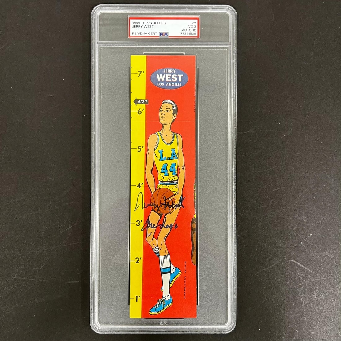 Jerry West signed 1969 Topps Ruler PSA DNA encapsulated VG 3 Auto 10: Jerry West signed 1969 Topps Ruler PSA DNA encapsulated VG 3 Auto 10 This is a 1969 Topps Rulers collectible featuring Jerry West, the legendary basketball player for the Los Angeles Lakers. The item 