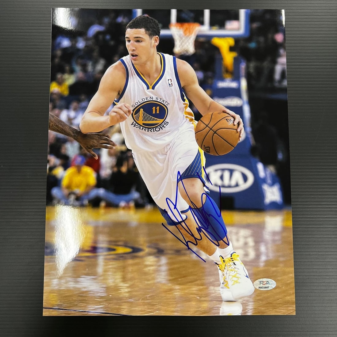 Klay Thompson Autographed 11x14 Photo PSA/DNA Golden State Warriors: Klay Thompson Autographed 11x14 Photo PSA/DNA Golden State Warriors This is an original 11x14 photograph featuring Klay Thompson of the Golden State Warriors, expertly signed by the player himself. Th