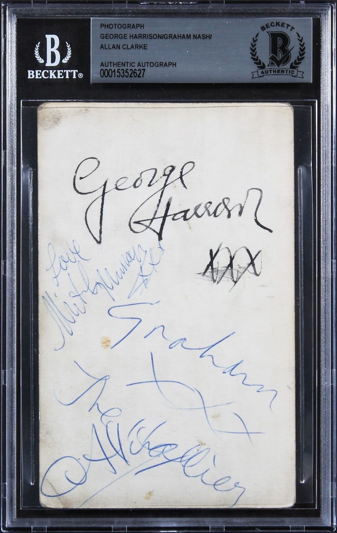 3.5x5.5 Signed Photo by Harrison Nash Clarke Beckett Authenticated Slab: 3.5x5.5 Signed Photo by Harrison Nash Clarke Beckett Authenticated Slab This 3.5x5.5 inch photo has been personally signed by George Harrison, Graham Nash, and Allan Clarke. The item is slabbed and ha