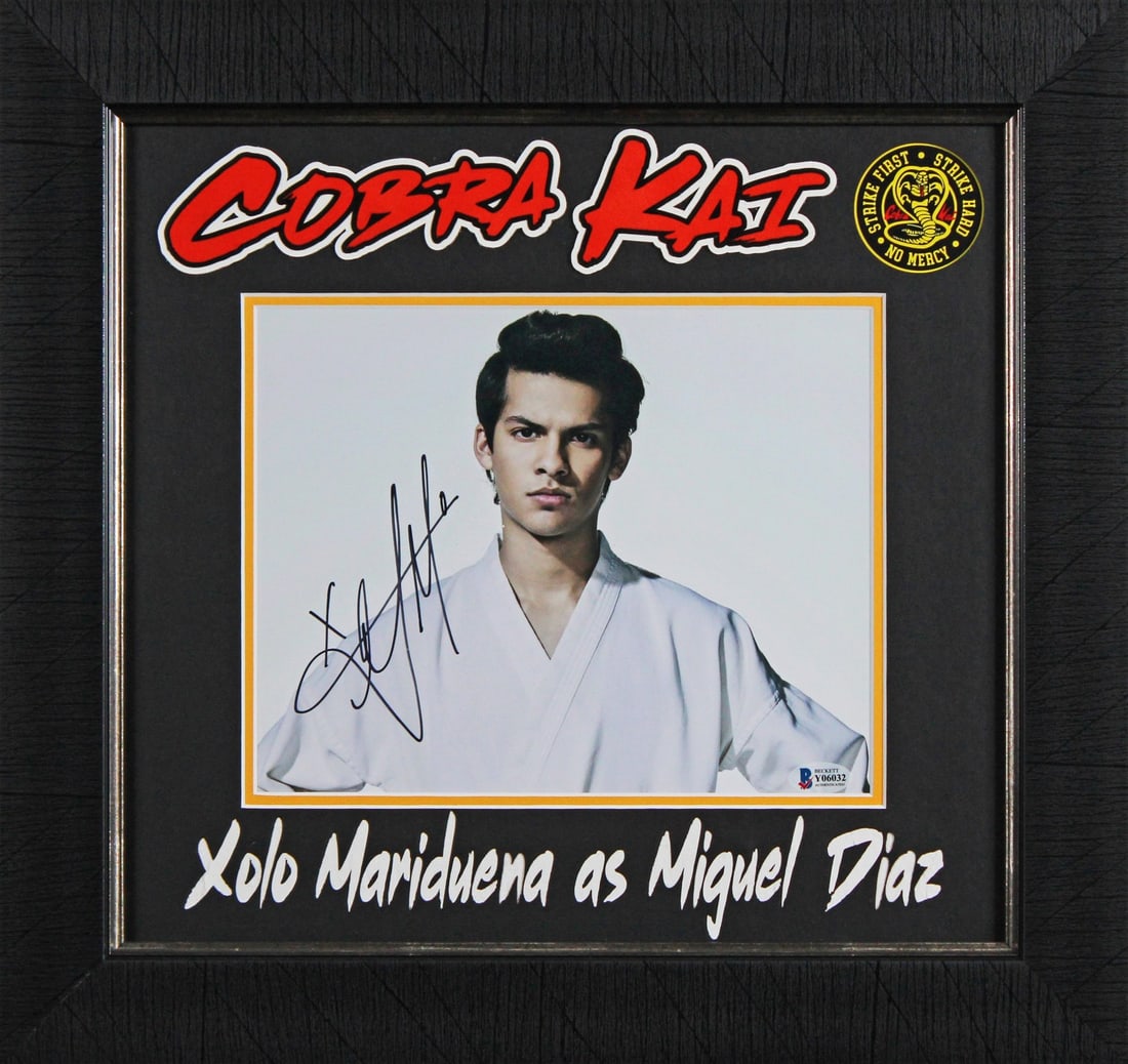 Framed 8x10 Photograph Signed by Xolo Mariduena with Beckett COA: Framed 8x10 Photograph Signed by Xolo Mariduena with Beckett COA This is an 8x10 photograph framed and personally signed by Xolo Mariduena from Cobra Kai. The autograph has been authenticated by Becke