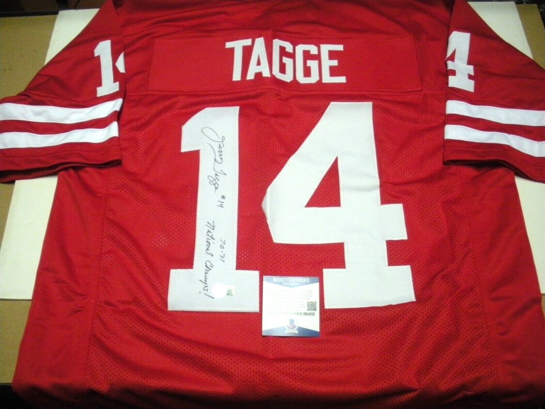 Signed Jerry Tagge Nebraska Football Jersey Beckett COA 1970 1971 Champions: Signed Jerry Tagge Nebraska Football Jersey Beckett COA 1970 1971 Champions This is a pre-owned Nebraska Cornhuskers jersey signed by Jerry Tagge, commemorating the 1970/71 championship seasons. The j