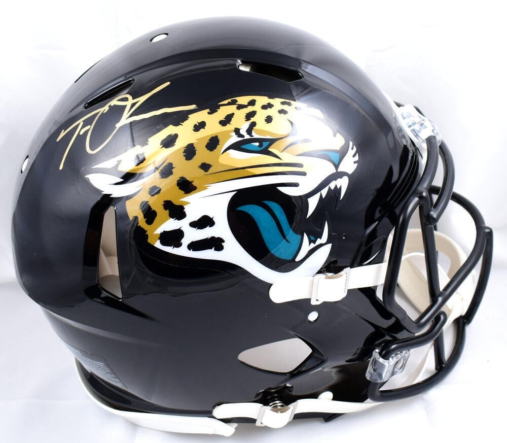 Trevor Lawrence Signed Jacksonville Jaguars Authentic Helmet Fanatics: Trevor Lawrence Signed Jacksonville Jaguars Authentic Helmet Fanatics This authentic full-size helmet is signed by Trevor Lawrence, the talented quarterback of the Jacksonville Jaguars. It is an origi