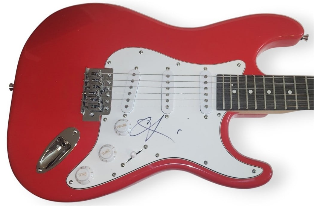 Christina Aguilera Autographed Electric Guitar JSA Authenticated: Christina Aguilera Autographed Electric Guitar JSA Authenticated Own a piece of music history with this authentic electric guitar signed by the iconic Christina Aguilera. This original guitar features