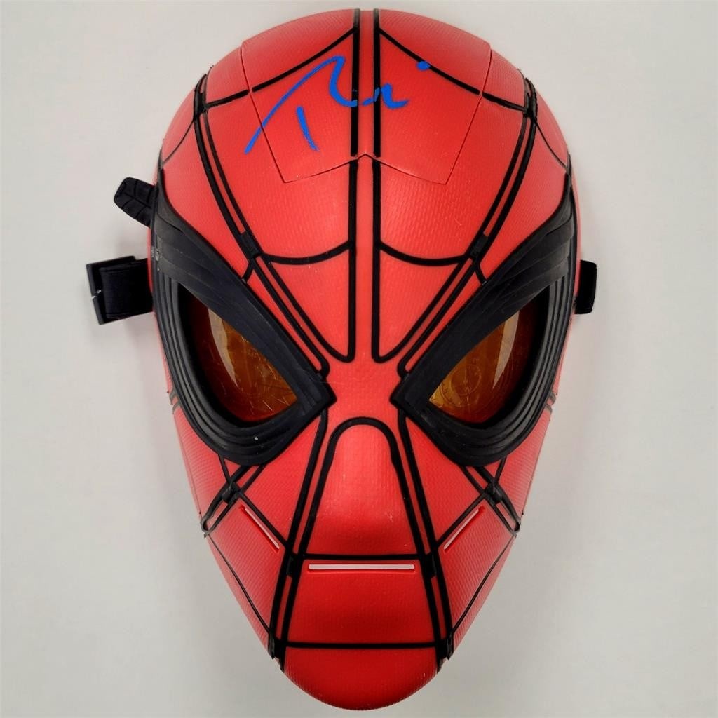 Spider-Man Glow FX Mask Autographed by Tobey Maguire Beckett Authenticated: Spider-Man Glow FX Mask Autographed by Tobey Maguire Beckett Authenticated This is an original Spider-Man Glow FX Mask autographed by Tobey Maguire. The signature has been authenticated by Beckett. Th