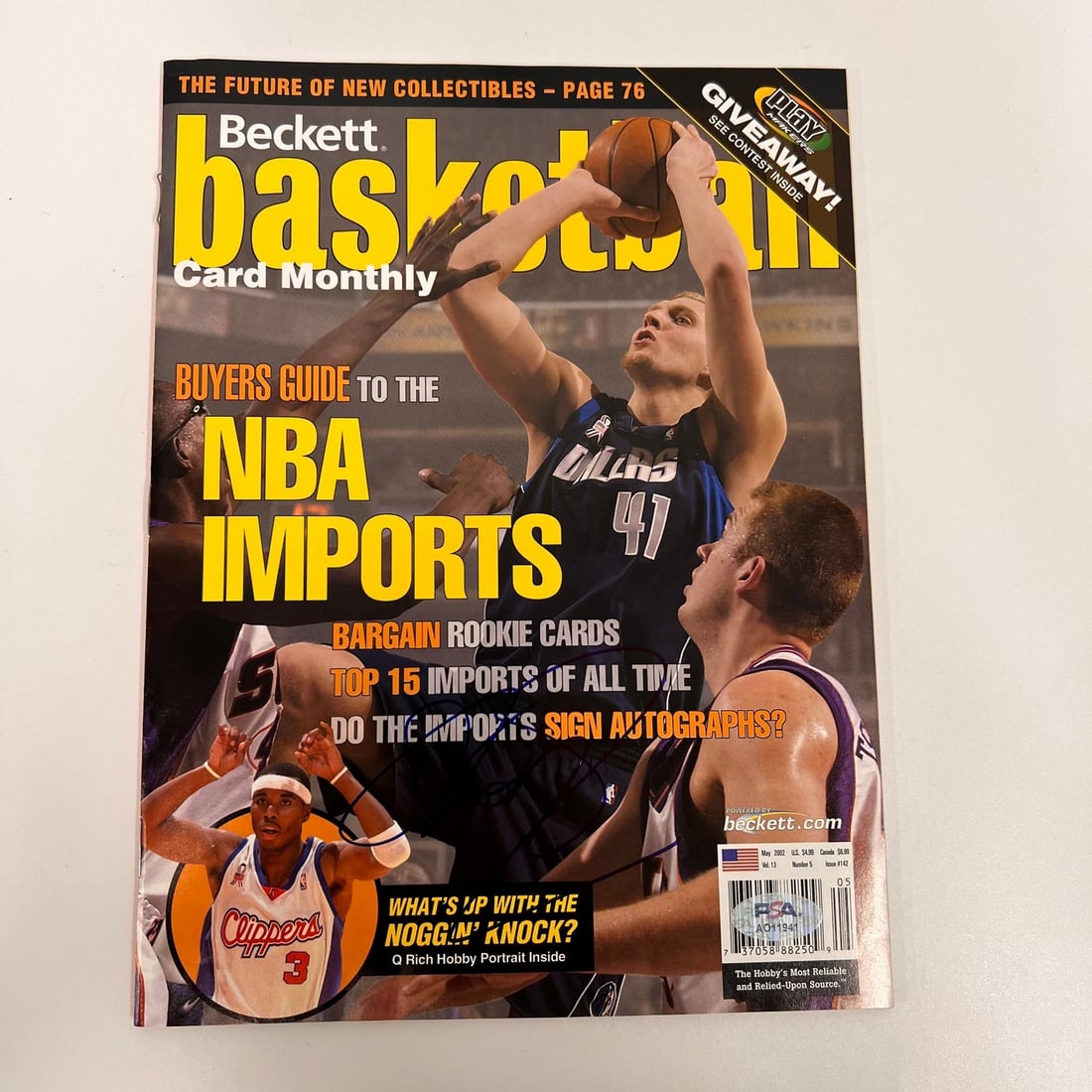 Dirk Nowitzki Signed Beckett Magazine PSA/DNA Dallas Mavericks Collectible: Dirk Nowitzki Signed Beckett Magazine PSA/DNA Dallas Mavericks Collectible This original Beckett Magazine features the signature of Dirk Nowitzki, a legendary player of the Dallas Mavericks. The authe