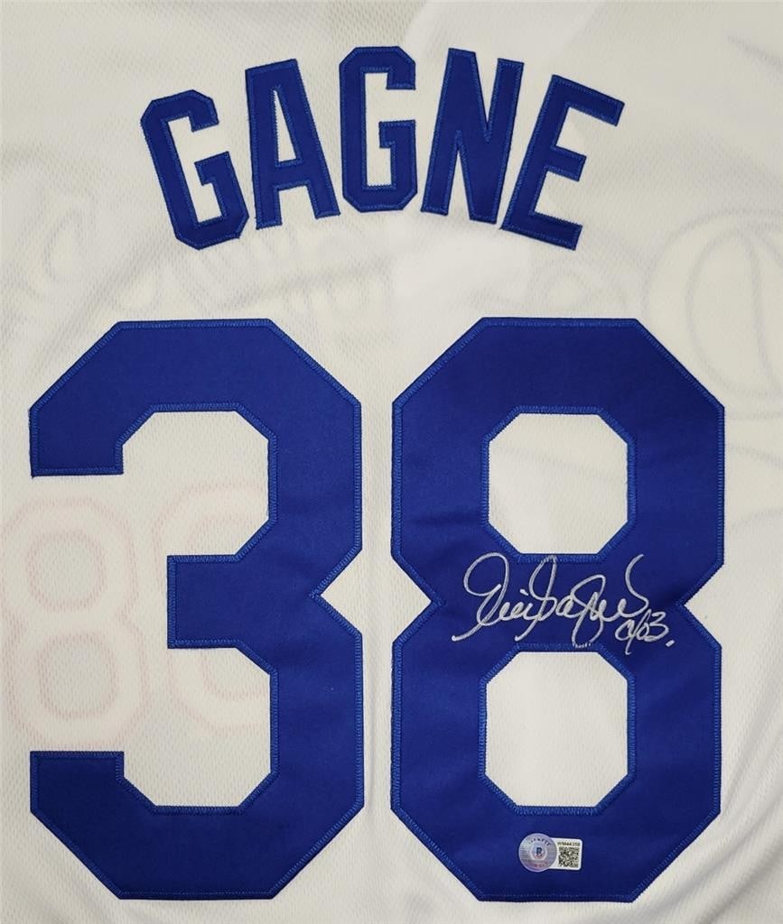 Eric Gagne Signed LA Dodgers Jersey with Beckett BAS Authentication: Eric Gagne Signed LA Dodgers Jersey with Beckett BAS Authentication This is an original signed Los Angeles Dodgers jersey featuring the full autograph of Eric Gagne, a celebrated player in Major Leagu