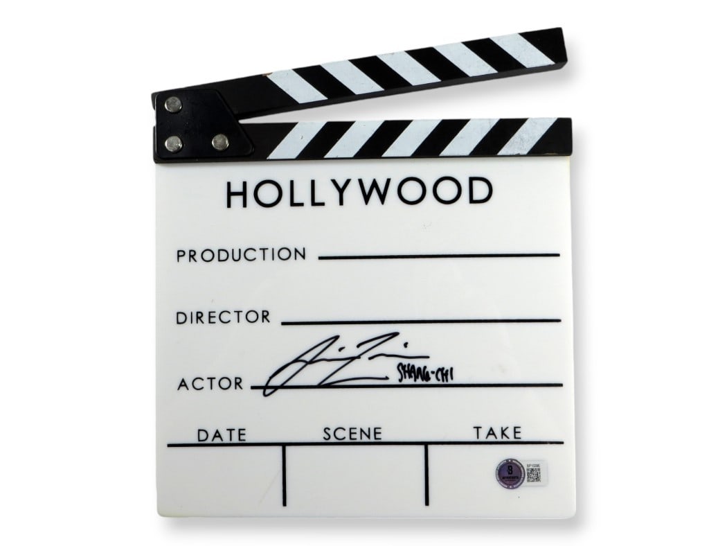 Movie Clapper Signed by Simu Liu Shang-Chi Ten Rings Beckett Authenticated: Movie Clapper Signed by Simu Liu Shang-Chi Ten Rings Beckett Authenticated This is an original movie clapper autographed by Simu Liu from the film "Shang-Chi and the Legend of the Ten Rings." The auto
